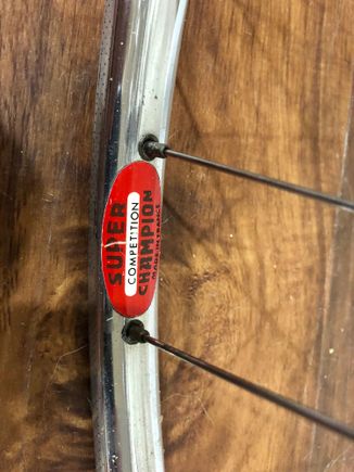 Original Super Champ rims, not marked as any model. They have the textured sidewalls, and are kinda heavy, I think even more than the Arc en Ciels...