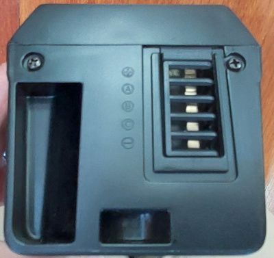 The base of the secondary battery, unobscured by any tape measure