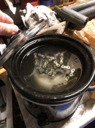 After about 90 minutes the wax is melted enough to swish chain and pull it out. Wax is at melting temperature. 