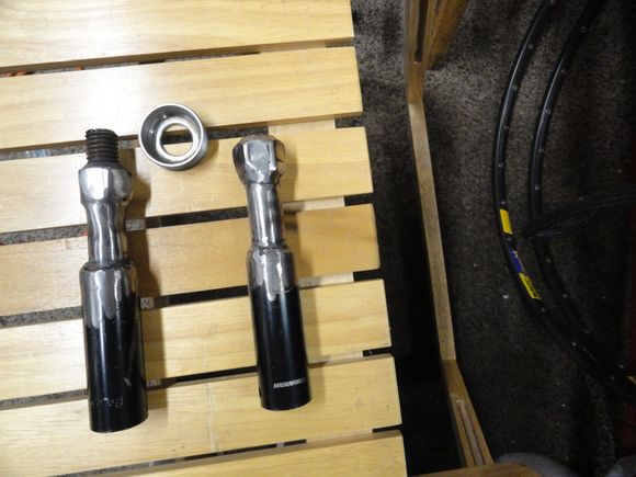 The tool is two pieces that fit together clamping the cup between them.  The length on each piece needs to be long enough to extend past the outer shell of the bottom bracket.  Each piece and a BB cup pictured.