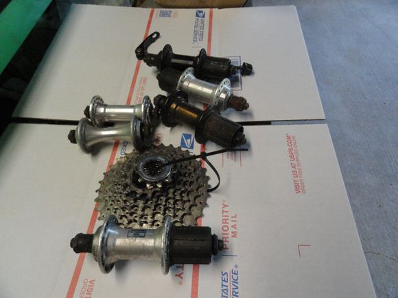 Looks to be four rear hubs the front being the one that fits the 8spd cassette.