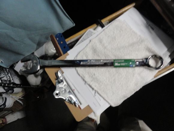 A 36mm combination wrench from a local big box store.  Cost was $20 before any discounts or rebates.  It is 20" long and gives plenty of leverage.  More than my VAR tool that only has  six inches of leverage.