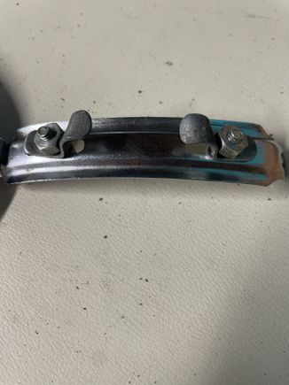 Those tabs fit over the saddle rails 