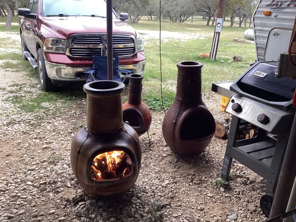 Rain in the way moved them under some shelter. Cool in the 50s cool enough for a chiminea fire and some tunes. 