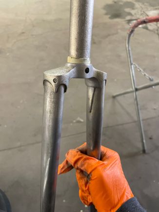 Note, in 1969/70, the fork did not have the club. That was introduced in 1971/72. But also note the two divots on the crown. 