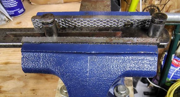 There's not enough thickness when clamped into the bench vise, and any twisting torque can release it from the vise jaws.
