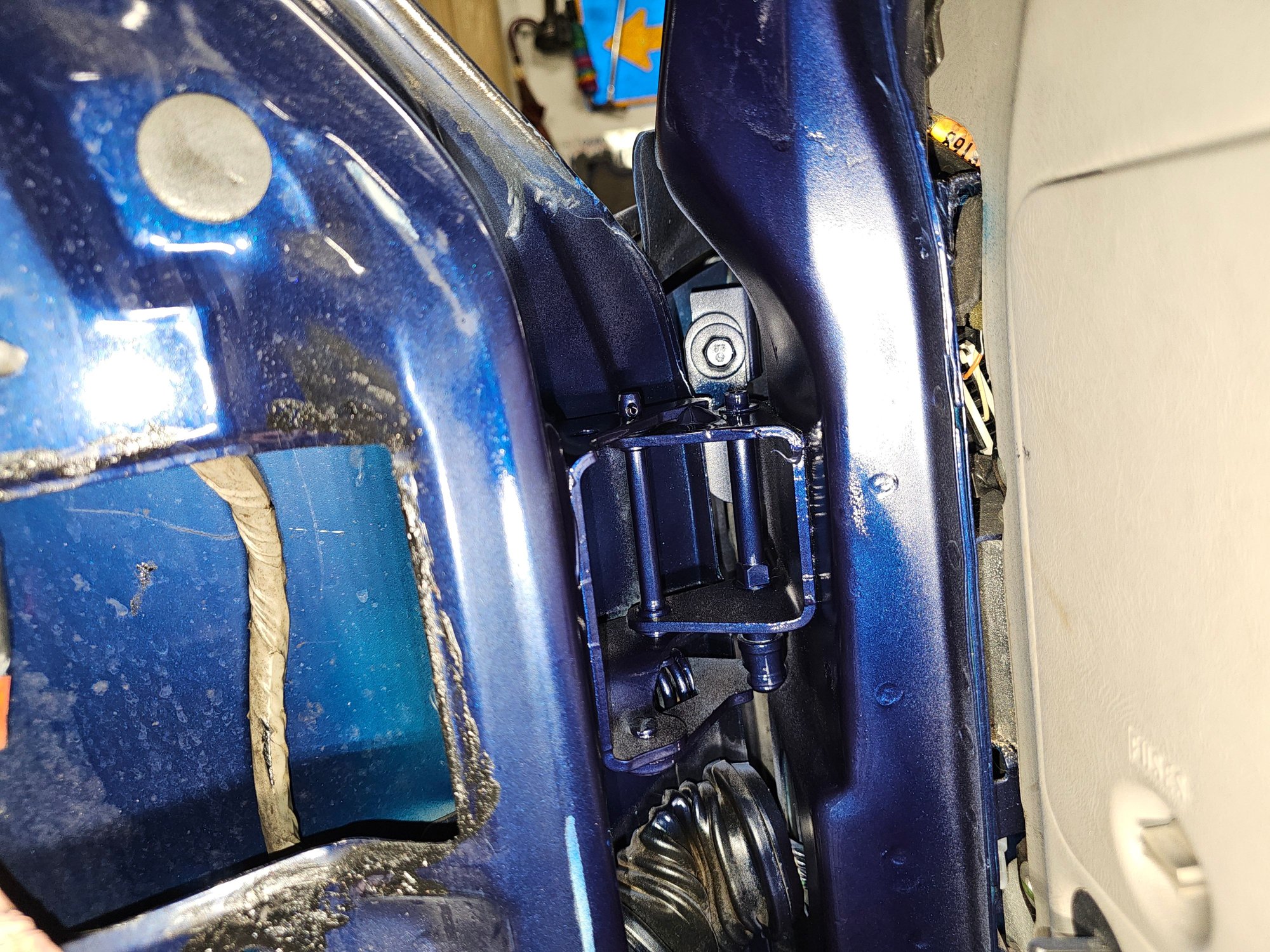 3 coats of self etching primer, 3 coats of paint, and 2 coats of enamel clear coat for a nice final finish. Open the door a dozen times and the roller is clean. Added some white lithium grease and she is good to go. 