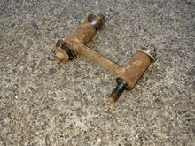 The old extender that mounted between the top of the shock and the body of the truck.