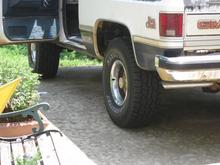 New Tires, Yes 33x12.50-15 will fit on stock lift with scrubbing.