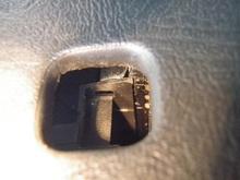 Steering Column socket for Hazard switch.  The little rectangular notch is the catch for the triangular tab on the hazard switch assembly.