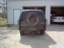 added a tire carrier off of a 2-door model