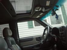 Passenger side shot showing Moon-roof and driver-side door panel