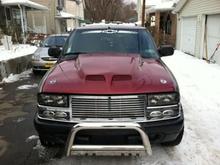 new hood , push bar and grille !! Also new headlights added to the truck!