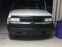 finished front end. I took the tint off the head lights cause it wasn't as bright as I wanted it to be. I picked up a better looking bumper (mine was also bent a little) from a pick your own part store, and painted it with plastidip.  I am very happy with how it came out. I don't know why it uploaded sideways. sorry for the inconvenience.