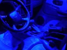 Blue LEDs on beige interior.