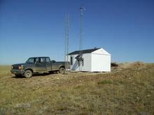 12x20 solar/wind, w/wood cookstove.
