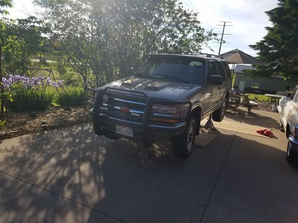 Visor painted and mounted and hood scoops mounted, all wheels back on and you cant see it but the frame is now painted black