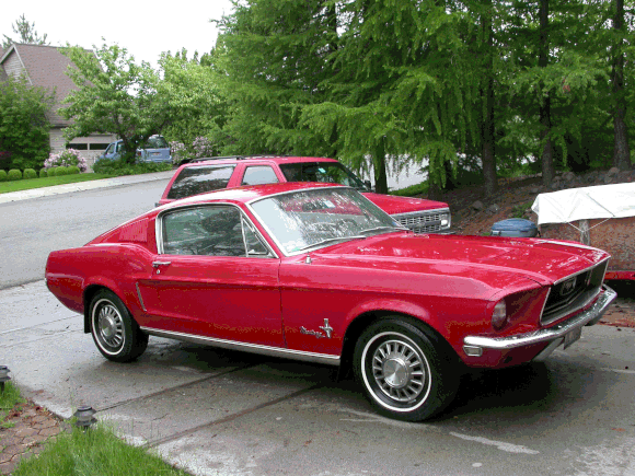 My one-family 68 Fastback Mustang with a 289. My old 92 Blazer is in the background.