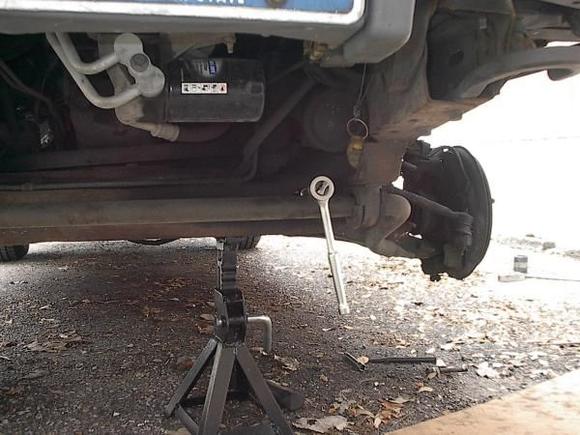 here you can see how to get at the front bushing nut without having to mess with the swaybar