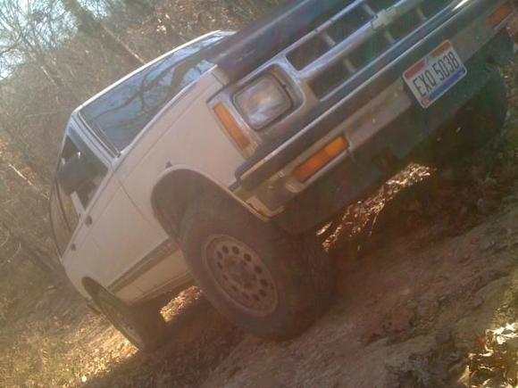 After putting this through some mud holes, that little rust hole on the fender got a little bigger and the fender trimming came off. Have it back on, kinda.