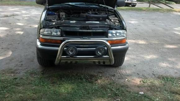 Original headlights before grill painted.