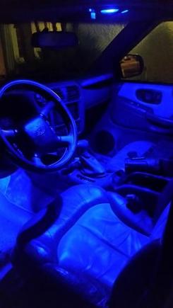 Blue LEDs on beige interior.