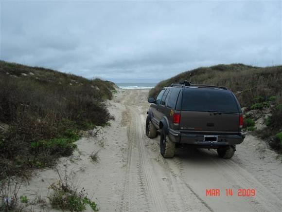 1998 Blazer Z85 - 2" Rough Country suspension lift - 2" PA body lift - 31" BFGs on 15x8 blackspokes with 5" backspacing - No, the tires are not bald, the treads are just full of sand