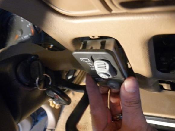 13 - Pull out bezel enough to remove this switch and remove harness connection