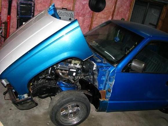 Oh yeah, i made the front clip tilt, this is half way open. No hood pins, hood latches. The hood still can open normally too.