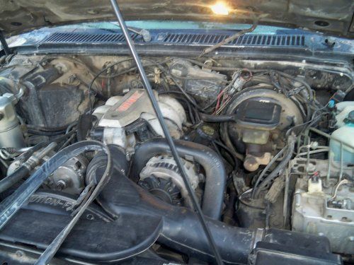 As you can see a little dirty. No drips on the ground after going for a test drive on the interstate. Sortof Fresh oil on oil filler side and under power break cylinder. Could be splashed. I think it is just from filling up since the oil cap in on that side.