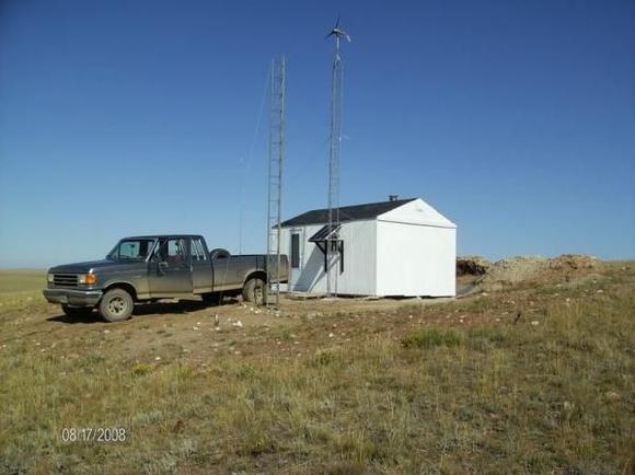 12x20 solar/wind, w/wood cookstove.