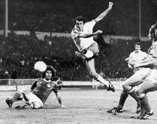 The late Ray Kennedy shoots for England against Switzerland at Wembley in 1977. 