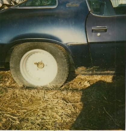 Busted shocks, and a rusted out lower quarter, and rocker.