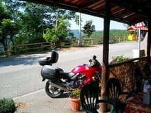 Great riding on the secondary highways between Genoa and Tuscany. Here we've stopped for an espresso and an orange. 2006
