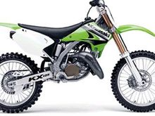 Kawasaki KX 125 was first dirt bike owned until I rode on george bush freeway when was just dirt and then slipped on asphalt and had some good road rash to my arms. Had to sleep with arms over head. Last dirt bike owned.