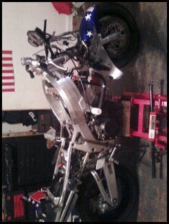 ripping down the cbr to replace the bent frame