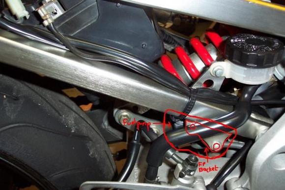 Closeup of R side of F4 subframe - Fuel Pump w/ bracket location.