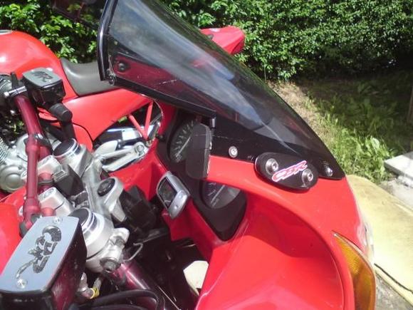Modded fairing and screen to alow Renthal bars clearence,mirror mounts blanked off...