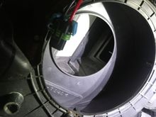 I am not sure what that white panel is for.  Is it a door for Air Recirculation?  It's very stiff.

Doing this gave me an idea.  A guy could put a sponge in the duct work here, run a tube to it from a fragrance jar, even going as far as adding a windshield washer pump and a button would be worth it.  The vehicle would always smell good.