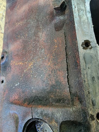 The cracks in the side of the 2 bolt main