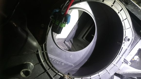 I am not sure what that white panel is for.  Is it a door for Air Recirculation?  It's very stiff.

Doing this gave me an idea.  A guy could put a sponge in the duct work here, run a tube to it from a fragrance jar, even going as far as adding a windshield washer pump and a button would be worth it.  The vehicle would always smell good.