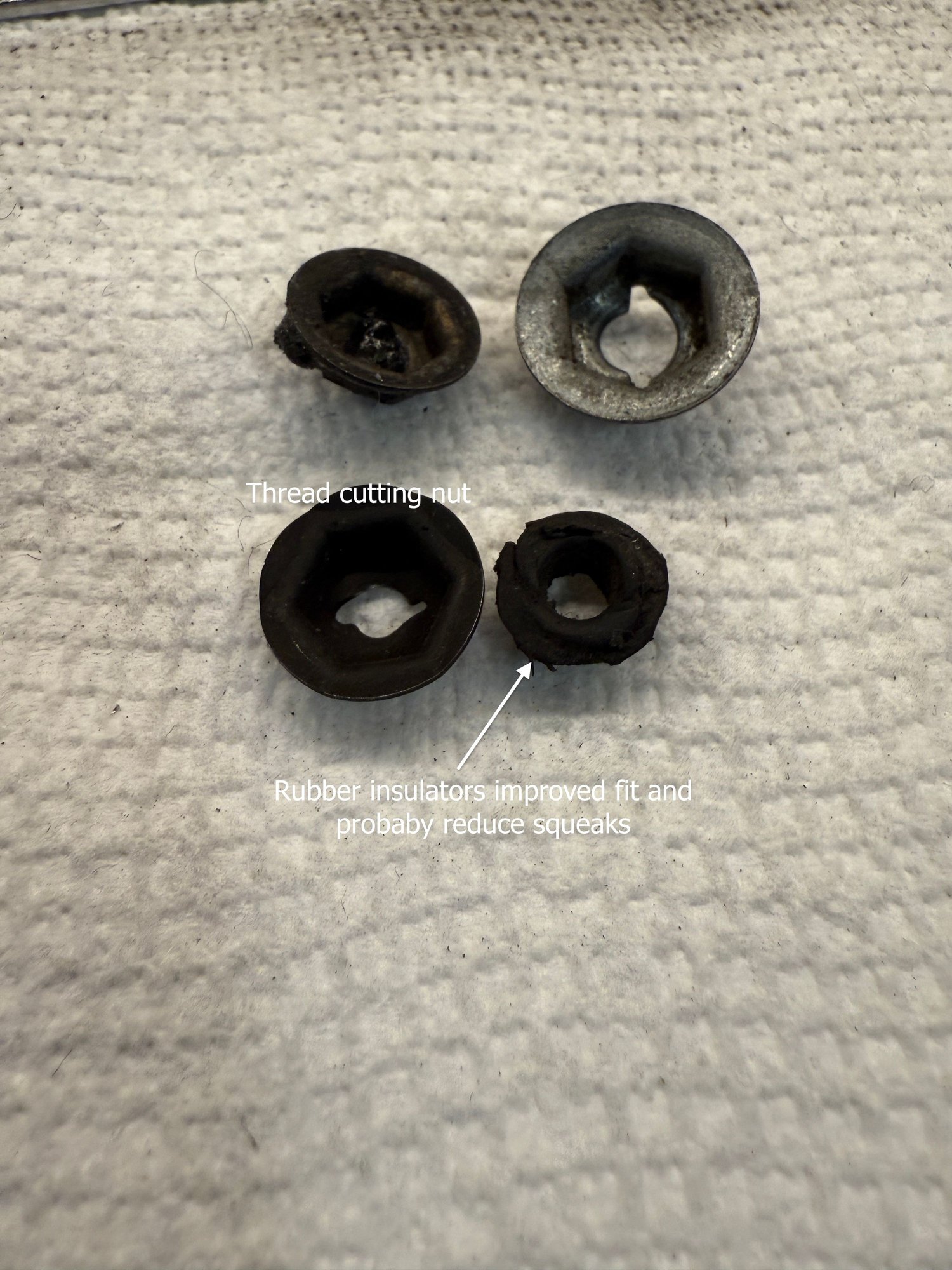 Typical mid-60's GM thread-cutting nuts and rubber insulator