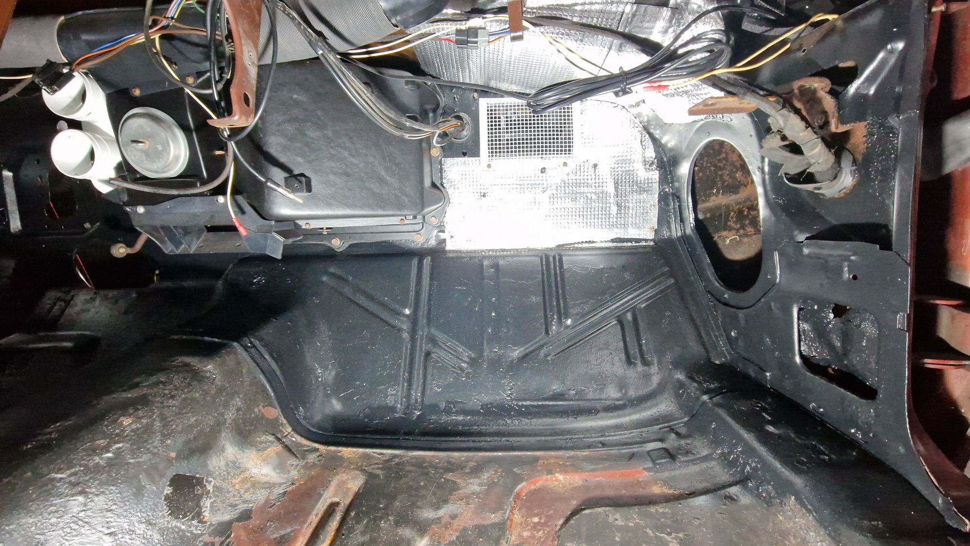 Passenger side, some sound deadening applied additionally
