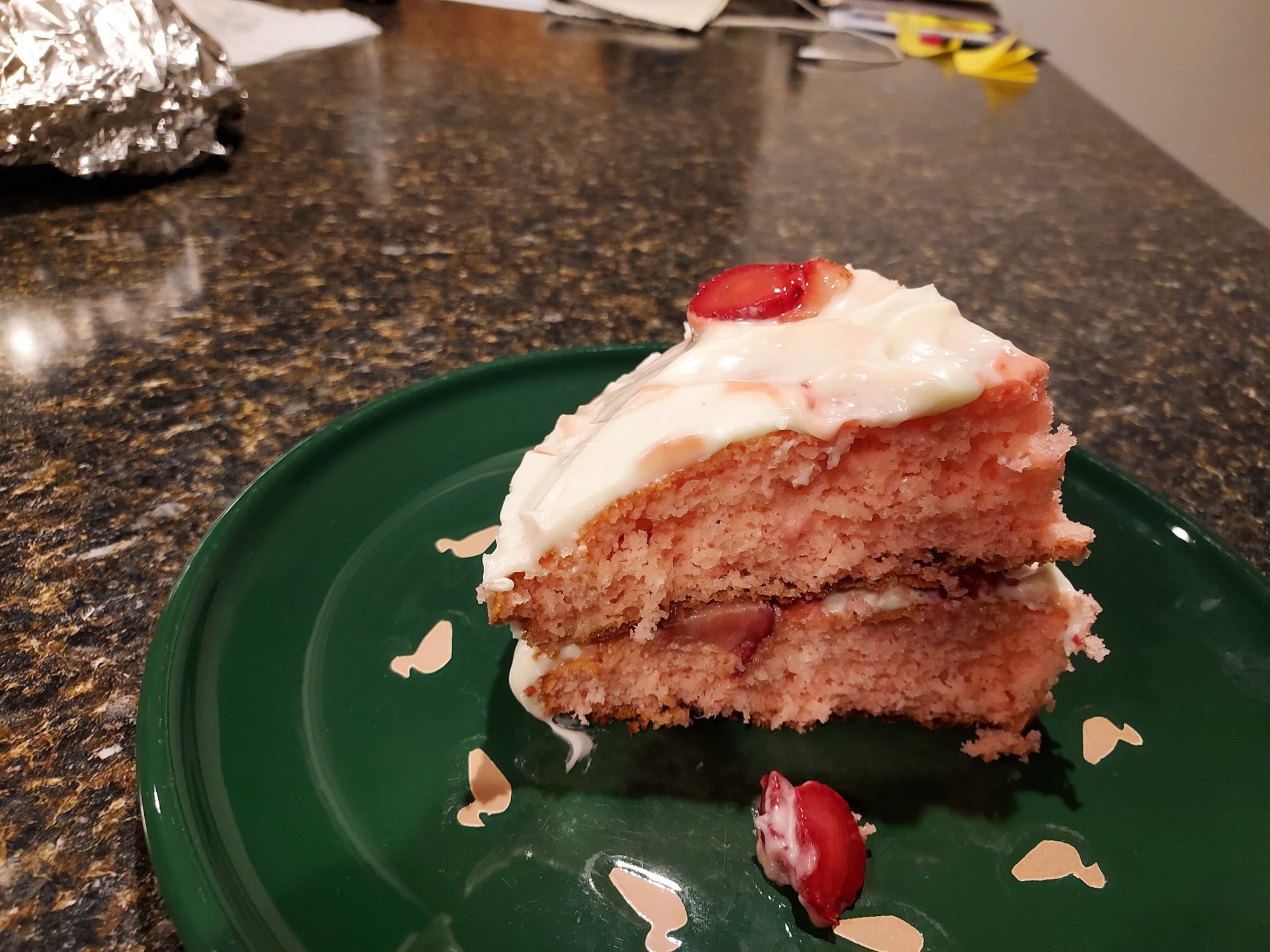 Strawberry cake with real strawberries and cream cheese icing.  Yummy!  😋 