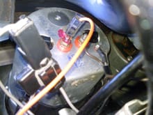Here is an original hook-up. The black wire (ground) should go from the passenger side screw that holds your speedo pod in place to the driver side screw that holds the tach/clock pod in place.
Randy C.