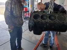 My Dad and little brother acting like they know something about engines.
