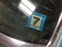 Last inspection sticker from 1986 still on the car from before it was parked