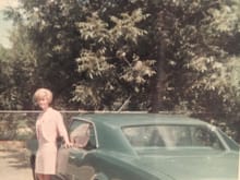 My mother in 1967 with her new car.