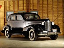 Here is a pic of my 37 when it belonged to Joe Macpherson in his museum "Joe's Garage"