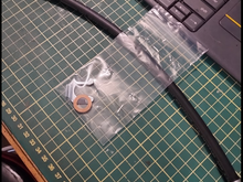 Note the copper washer included in the kit.